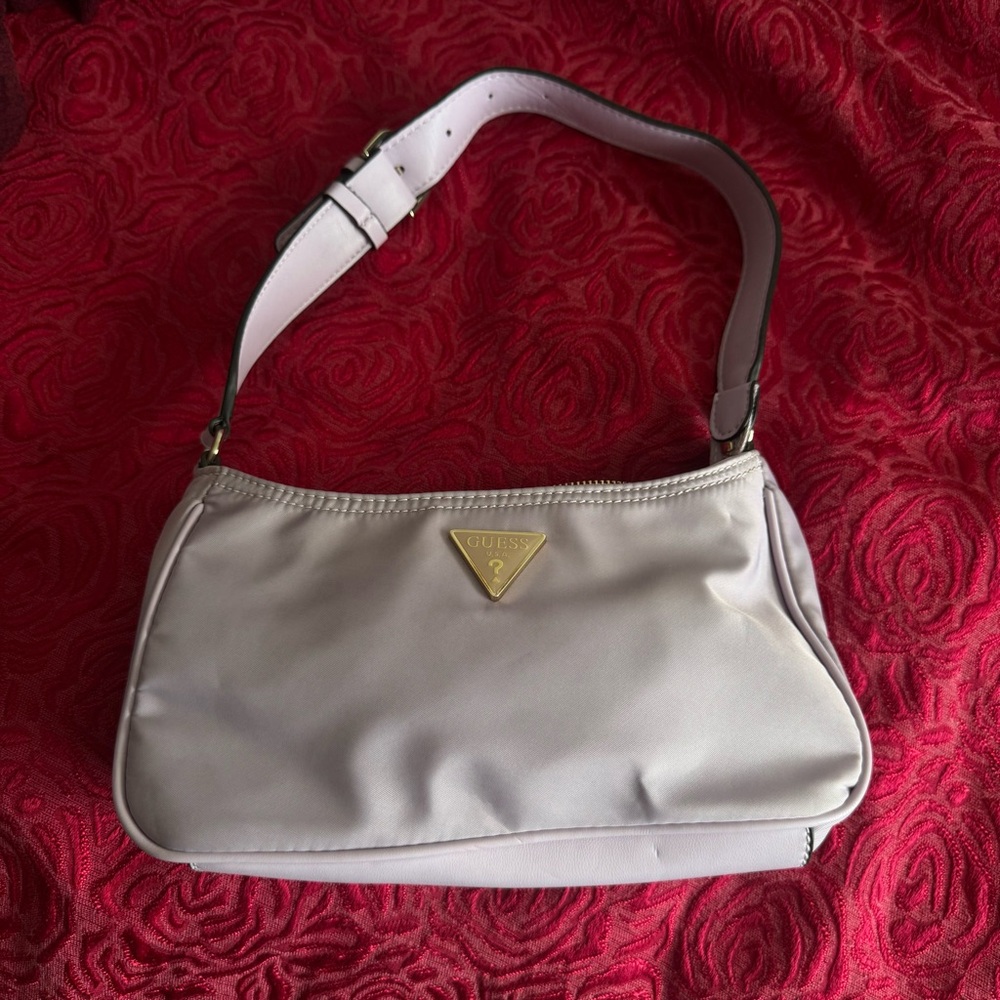 Guess little bay shoulder bag / color: purple